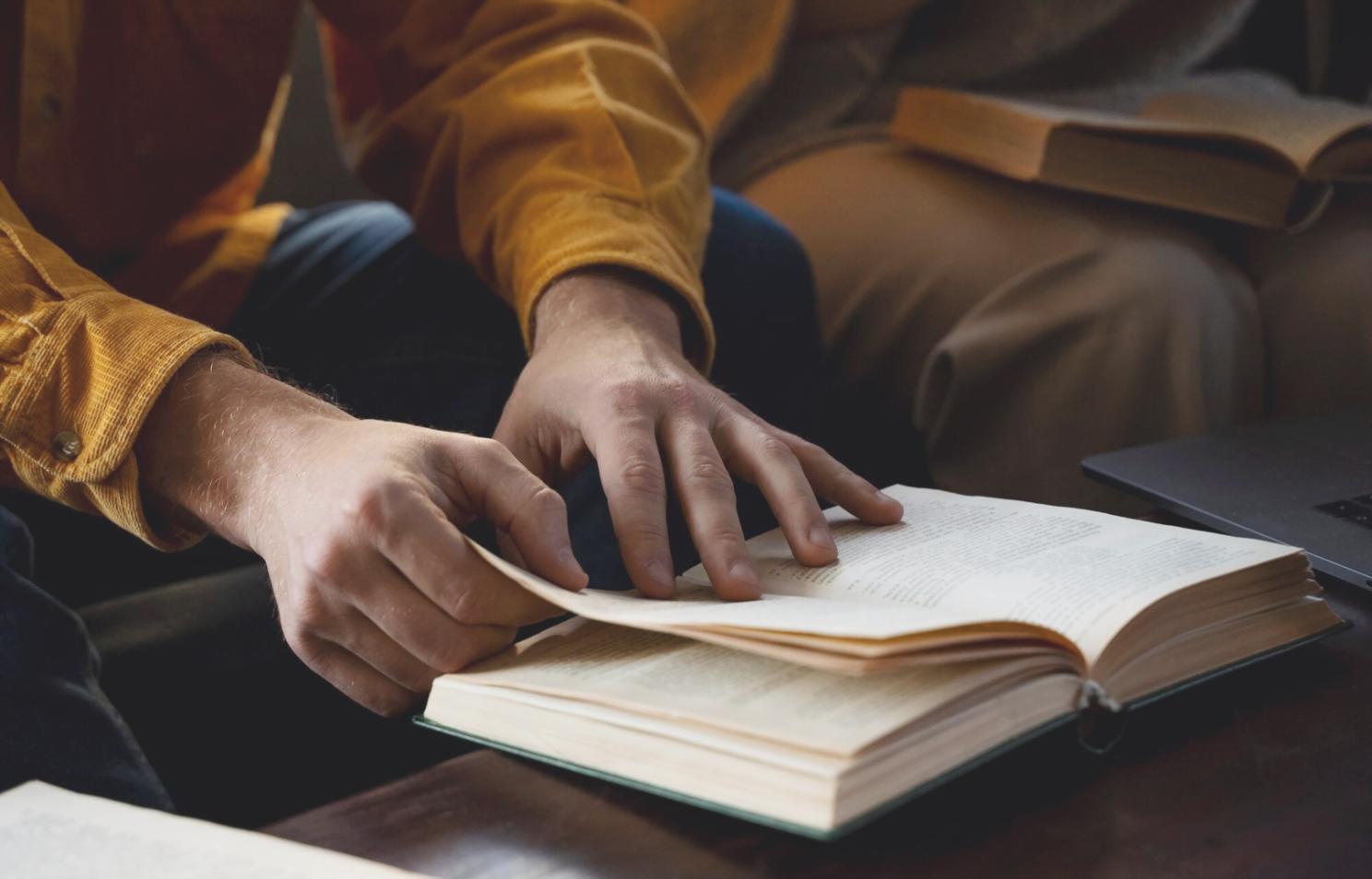 Financial analysis workspace with market data and investment research materials